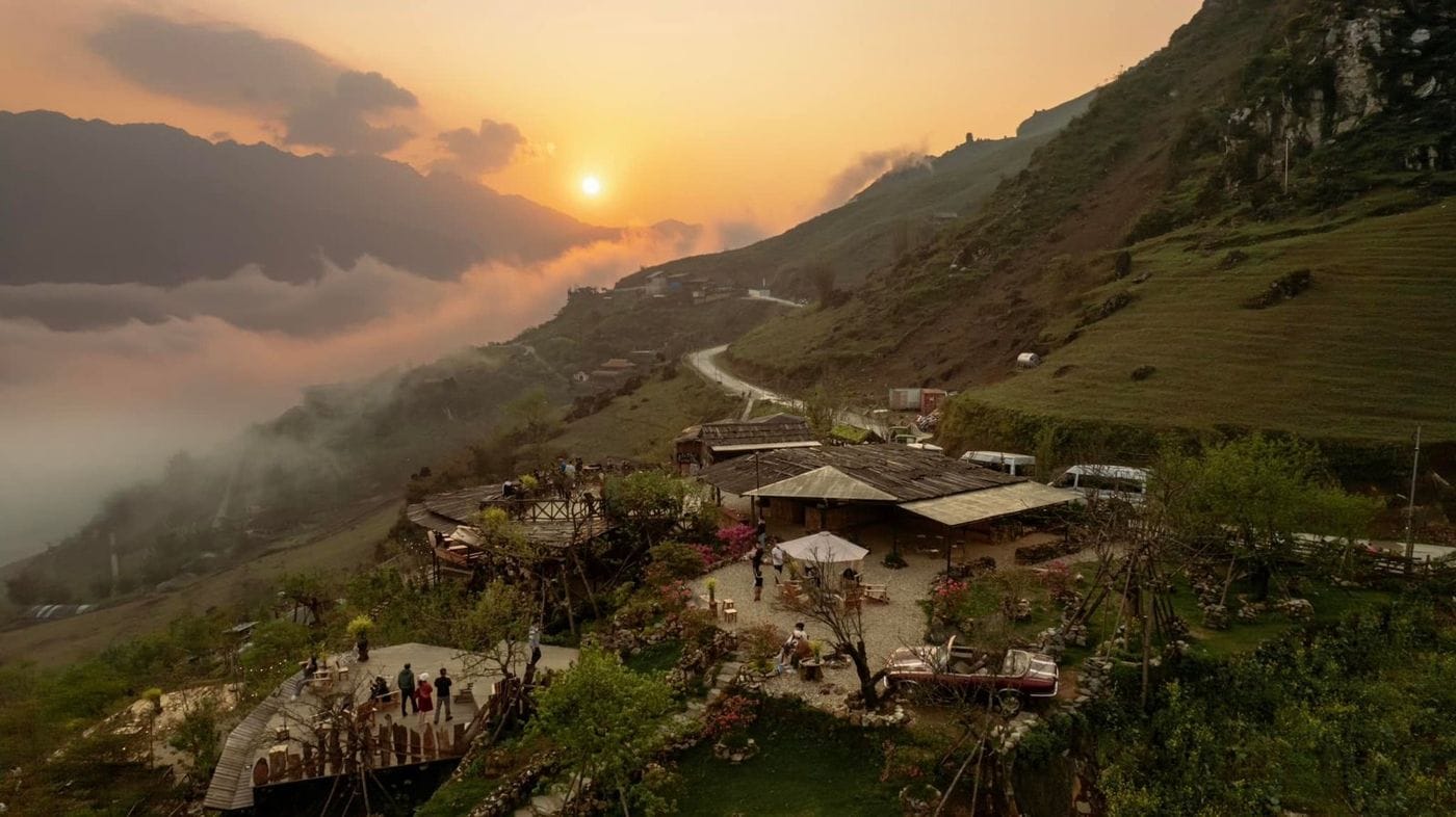 The Best View site on the hillside at sunset, with cloud rolling below.